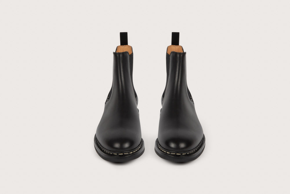 Tremble women's boots in smooth black leather mounted on a rubber